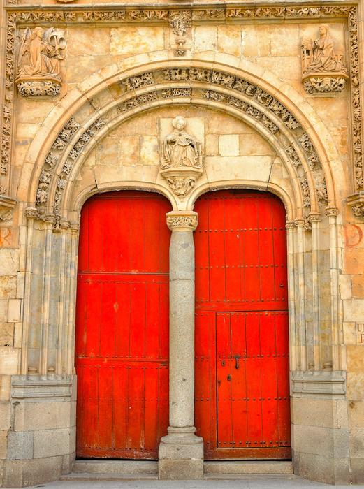 The red doors of the church are beautiful