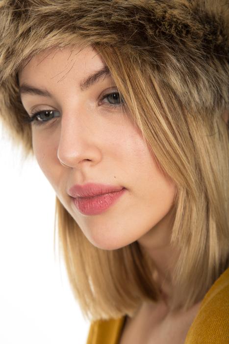 blonde girl with a pretty hat.