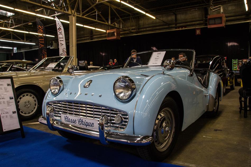 blue car with headlights