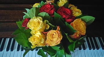 bouquet of Roses in front of Piano