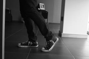 White and Black photo of Man legs