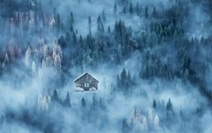 Landscape with the winter cabin among the forest in mist, clipart