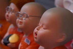 plastic dolls in a row close up