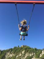 Flying High Swing child