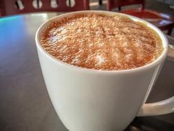 cup of frothy coffee