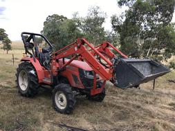 Rural Tractor on Farm