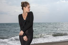 girl black dress sea