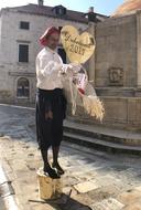 photo of a street artist in Europe
