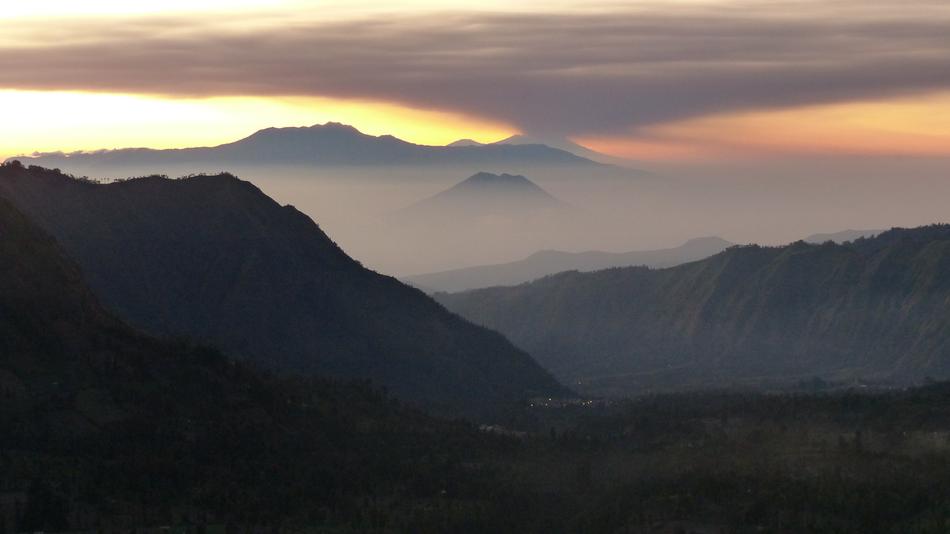 silhouette of mountains with fog landscape