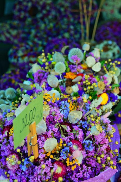price tag on a bouquet of flowers for sale