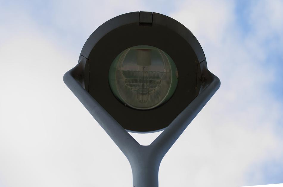 modern street lamp in the background of clouds
