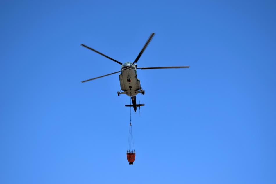 helicopter in the blue sky landscape
