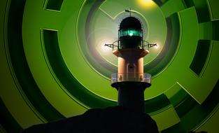 lighthouse on the background of a green labyrinth