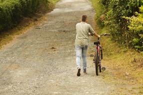 a man with a bicycle