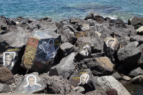 portraits of Musicians on stones at sea, spain, Santa Cruz de tenerife