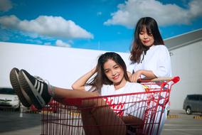 Girls red shopping cart