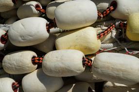 white floats on a rope