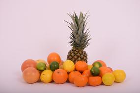 ripe tropical fruits on a white background