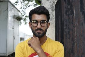 young bearded Man in glasses outdoor, Portrait