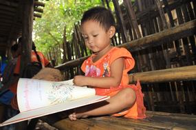 charming Kid Reading Book