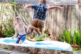 child boys playing in Swimming Pool