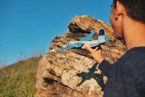 Airline Toy in mans hand