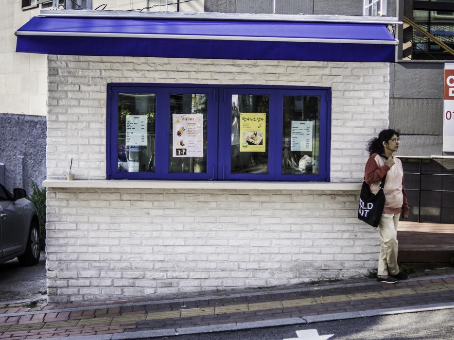 woman outside the building