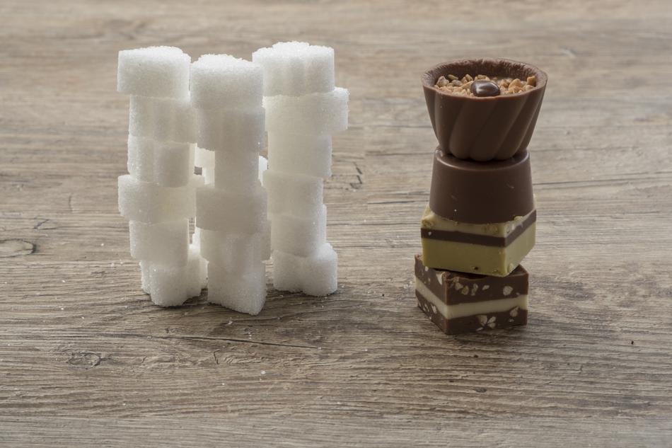 Chocolate candies with sugar on the table