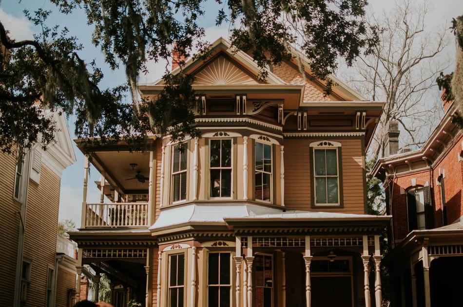 historical victorian house with terrace exterior