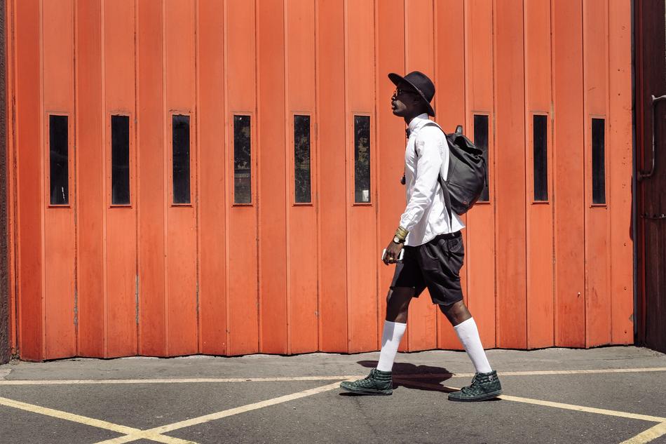 African American with a backpack on the street