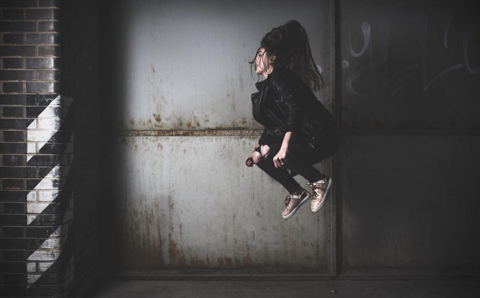 girl jumping in the garage