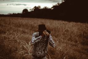 Man Camera dry grass