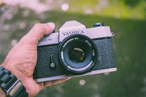 yashica, Vintage photo Camera in male hand