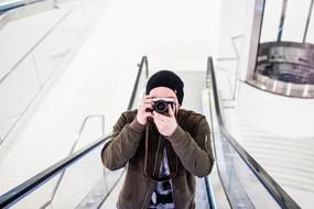 Man Photographer escalator