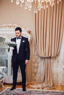 Man groom in a suit