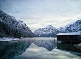 lake house in the snowy mountains