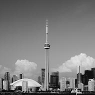 monochrome photo of city tower skyline