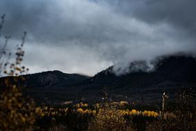 silhouette of black mountains in the clouds landscape