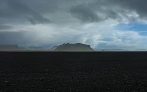 big mountain in the clouds landscape