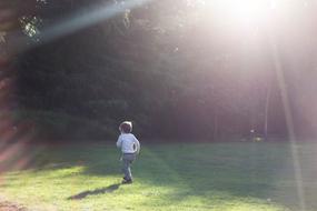 Baby Boy green grass sky sun
