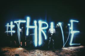 neon text thrive