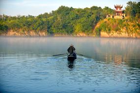 a man boating in a lake