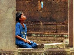 boy in sports uniform in cambodia