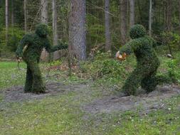 photo of bushes in the form of football players