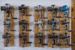 wall decorated with meat grinders
