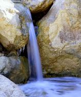 stone wall with waterfall landscape