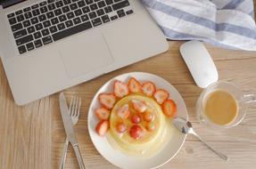 pancakes in strawberry sauce