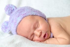 Baby Dream in violet hat