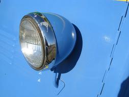 Electricity Lamp on blue old car