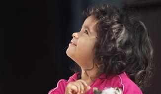Cute baby girl, looking up, in Armenia